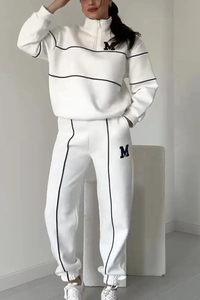 Charlotte | Completo da tuta varsity con mezza zip per uno stile casual