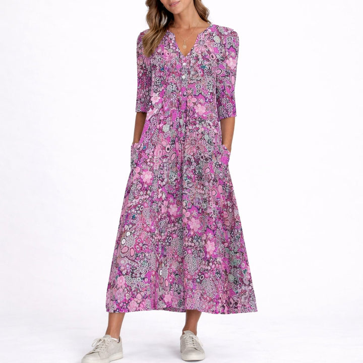 Amelia | Robe midi élégante et polyvalente à motifs floraux pour mariage d’automne