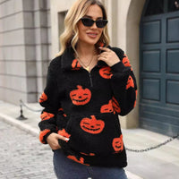 Noelle | Maglione di Halloween in peluche con stampa di zucche e tasca frontale